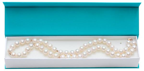 Удлиненная упаковка с бусами Удлиненная упаковка с бусами